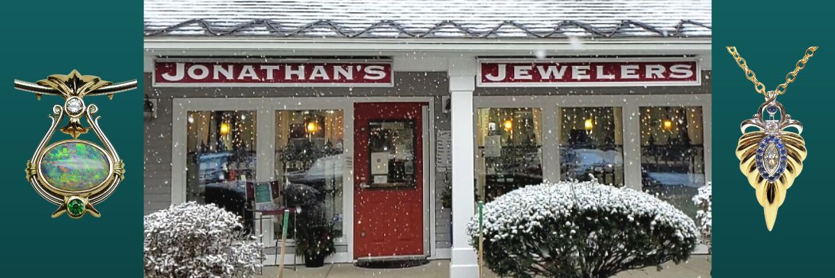 photo of front of store and two custom pendants