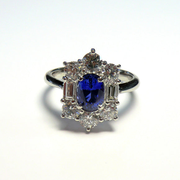 Estate platinum ring with sapphire and diamonds