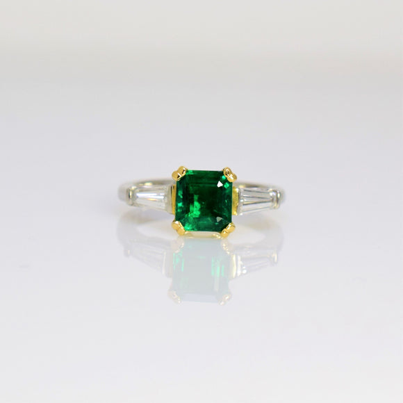 custom emerald and diamond ring