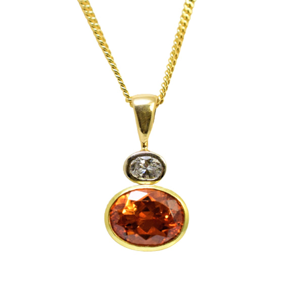 spessartite garnet and diamond ring
