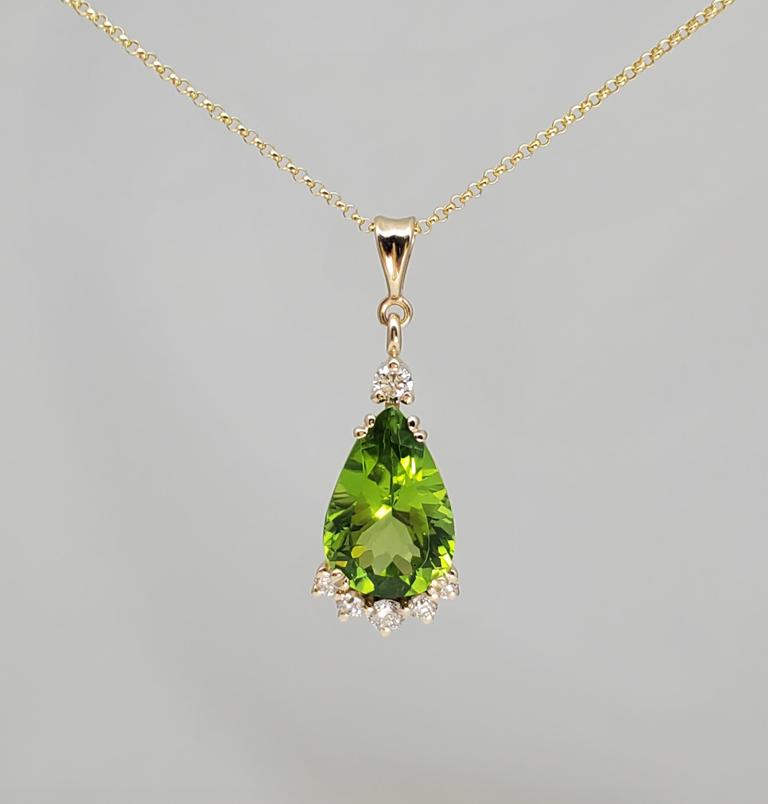 Pear Shape Peridot Pendant with Diamonds