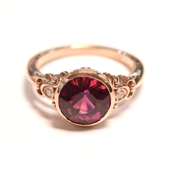 14k Rose gold ring with pink tourmaline and diamonds