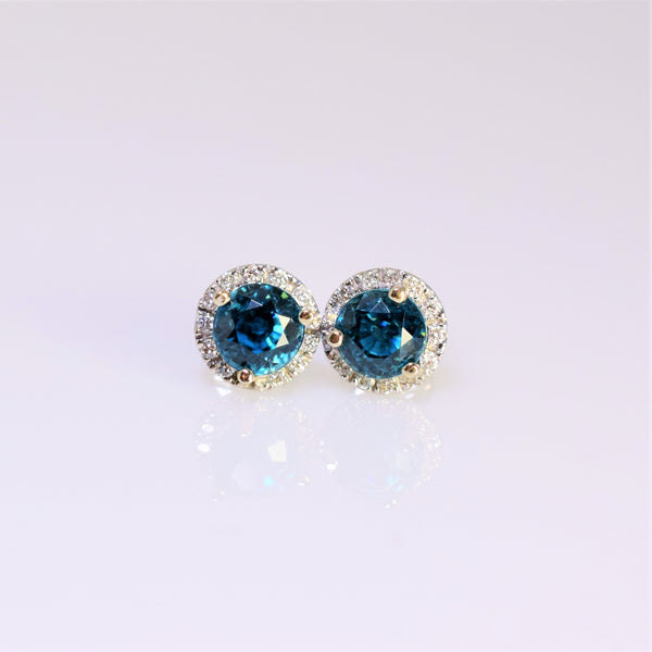 14k white gold blue zircon and diamond earrings