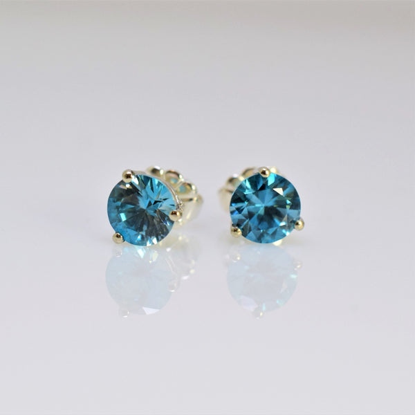 14k white gold blue zircon earrings