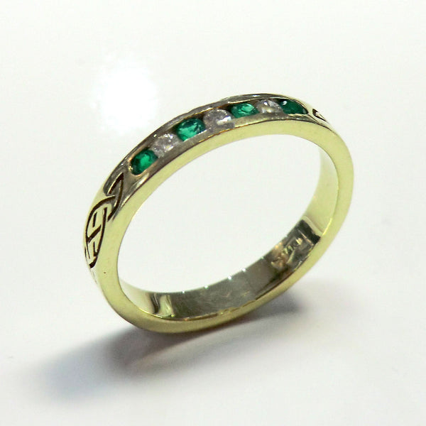 14k yellow celtic ring with emerald and diamond