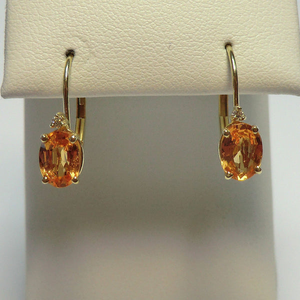14k yellow earrings with spessartite garnets and diamonds