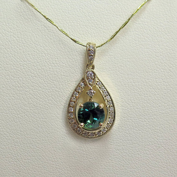 14k yellow pendant with green tourmaline and diamonds