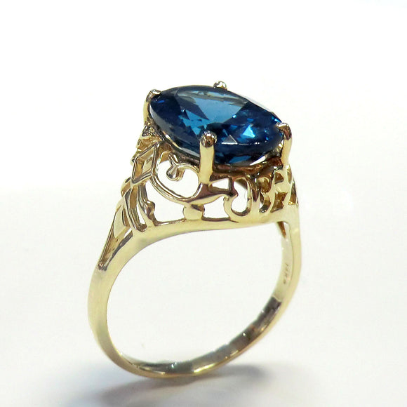14k yellow ring with london blue topaz