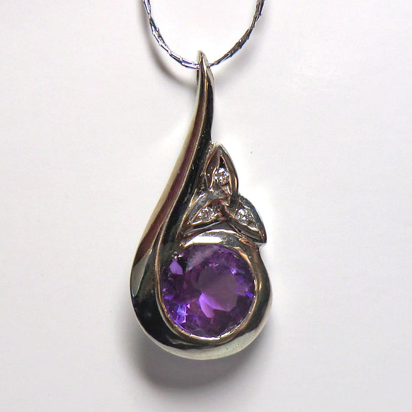 Custom 14k white celtic knot pendant with amethyst and diamonds