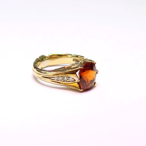 Custom 14k yellow ring with hessonite garnet and diamonds