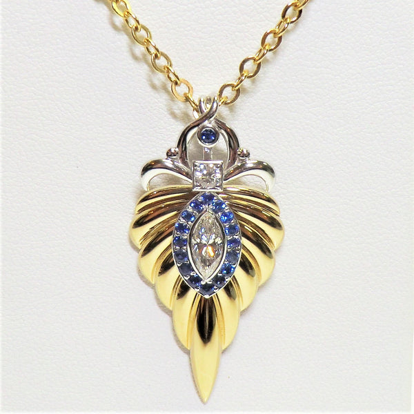 custom 14k two-tone diamond and sapphire pendant